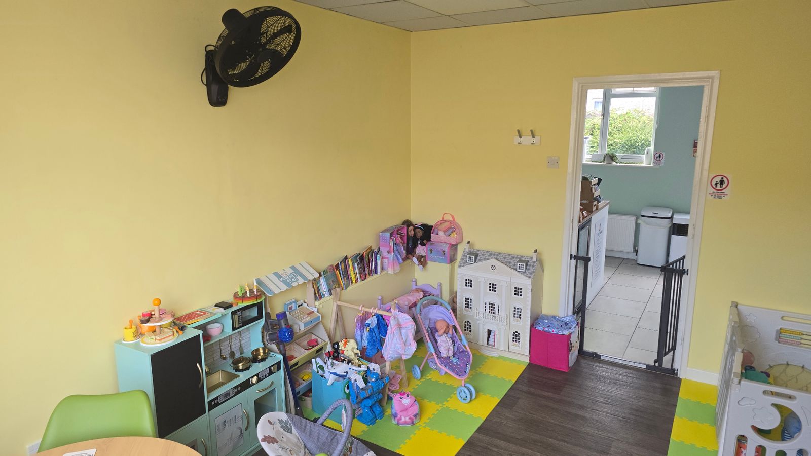 Dollhouse and dress-up corner